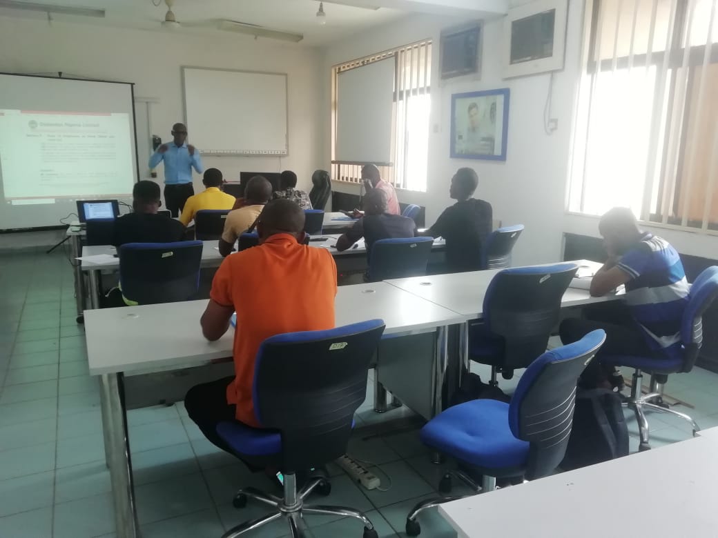 A training session with DGIL staff instructing clients.